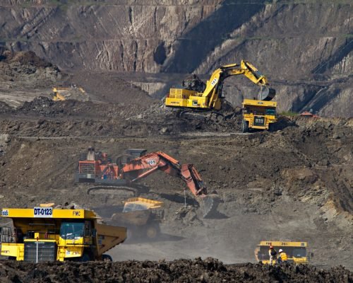 photography of excavators at mining area